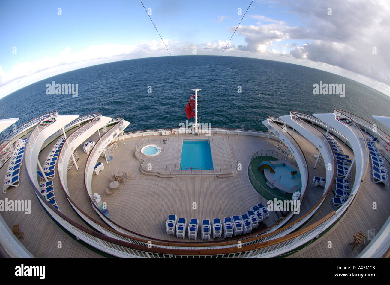 swimming pool and rear decks on a cruise ship Stock Photo Alamy