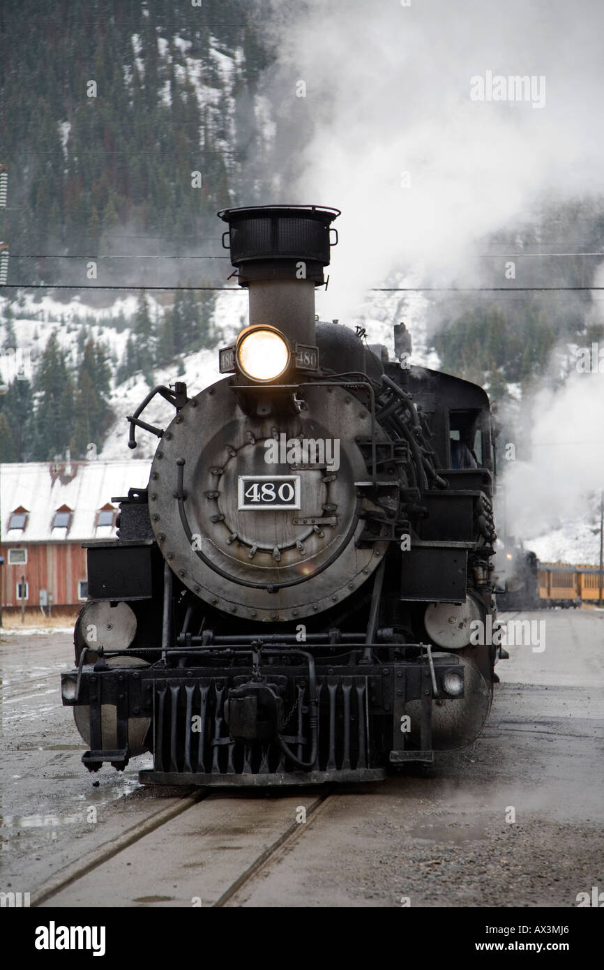 K 36 class steam engine of the Durango and Silverton Railroad pulling in at snow covered Silverton Colorado USA Stock Photo