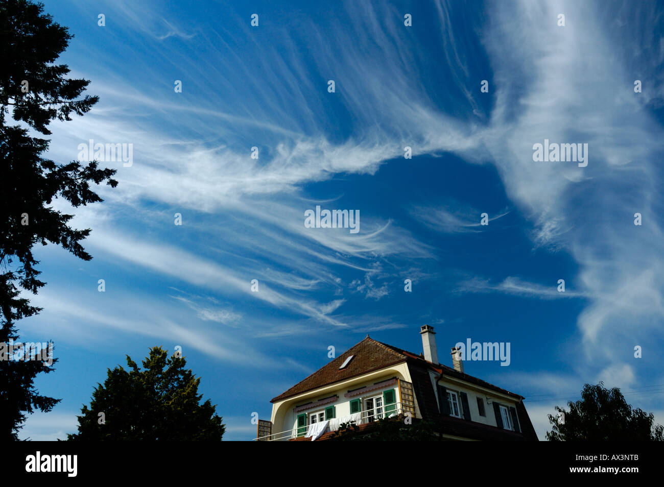 cirrus clouds called mares tails also known as fallstreaks stock photo alamy