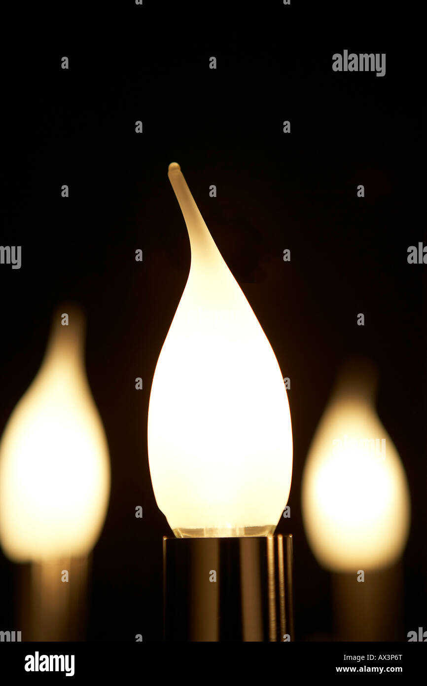 Traditional white household wax candles with brown paper packaging. Emergency  lighting electricity backup Stock Photo - Alamy