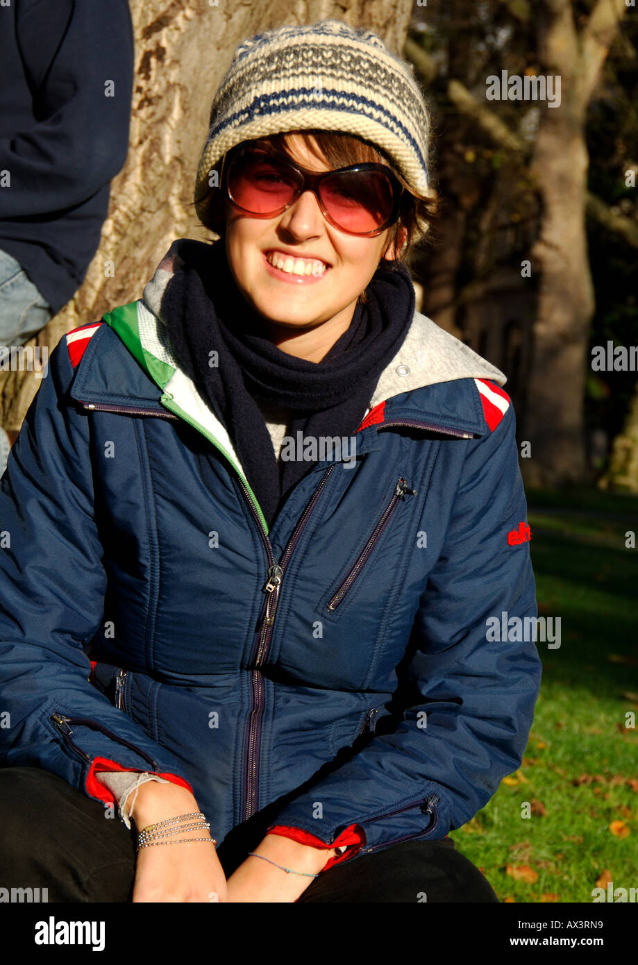 Portrait of a young woman wearing sunglasses Stock Photo - Alamy