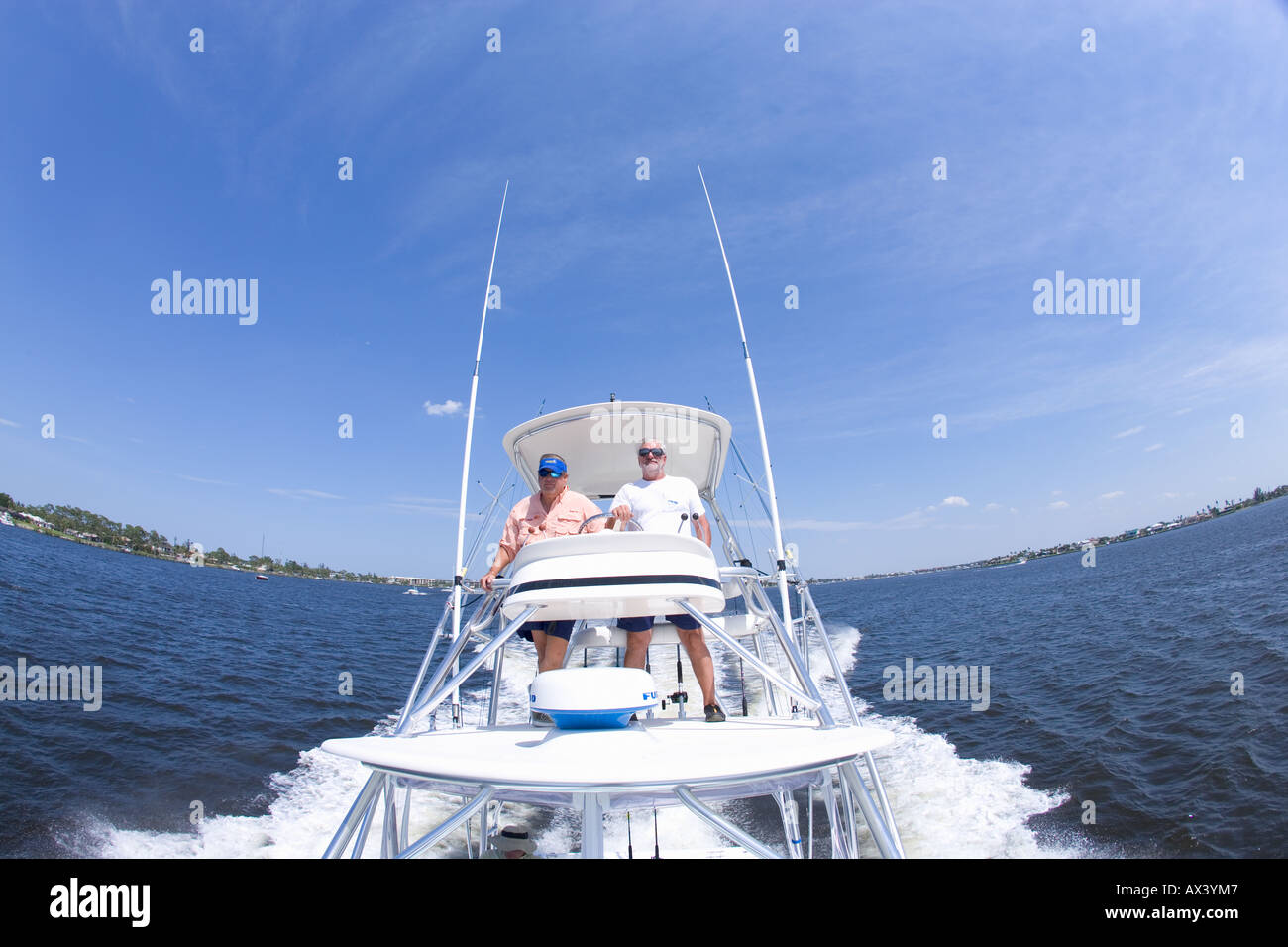 Two men on sportfishing boat in Stuart, Florida, USA. Stock Photo