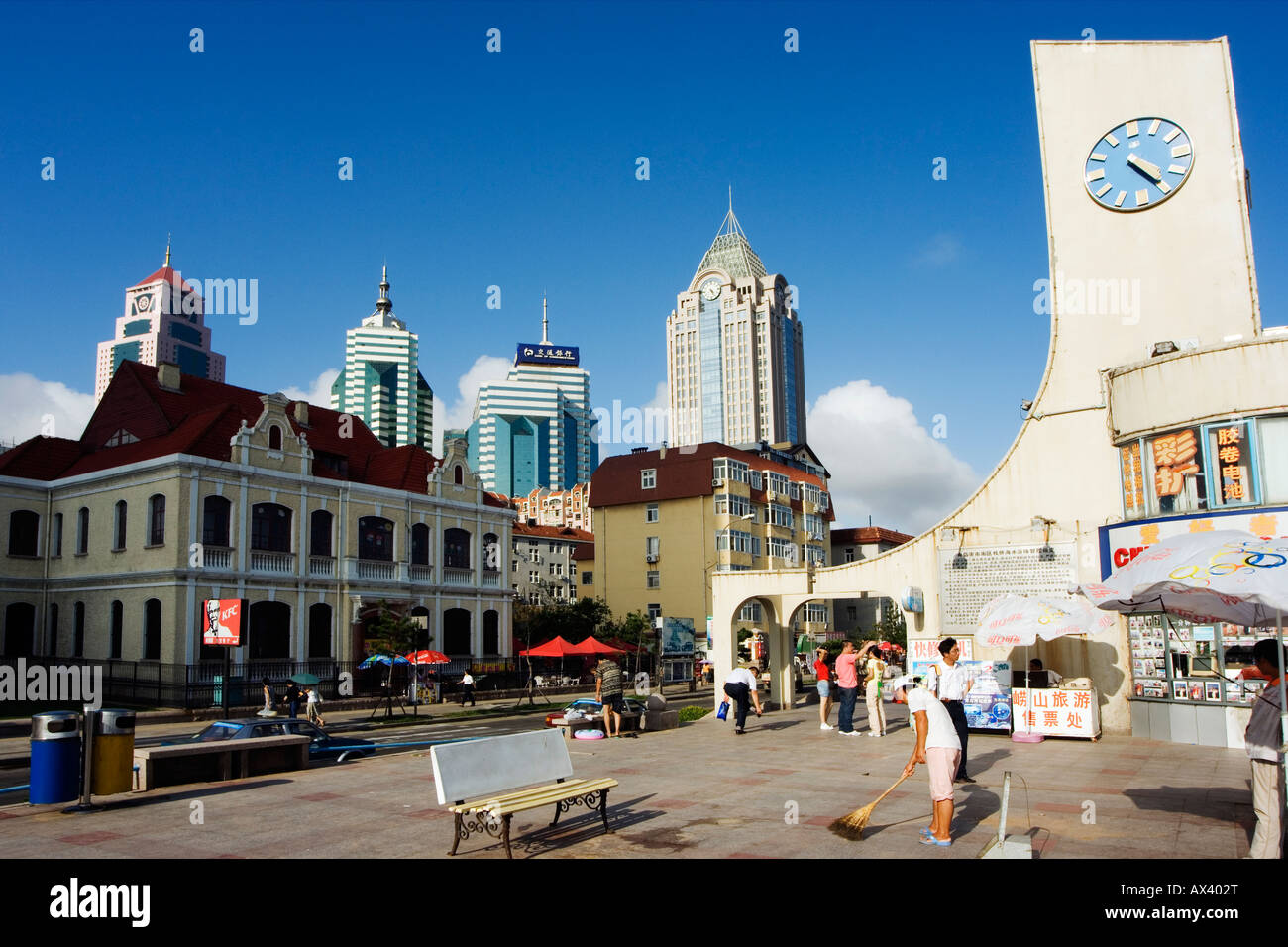 China, Shandong Province, Qingdao City. A clock tower and modern