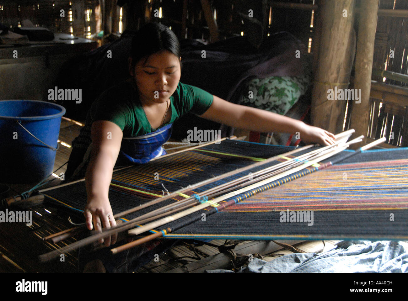 Tripura Village, minority woman weaving sari, Chittagong Hill Tracts, Eastern Bangladesh Stock Photo