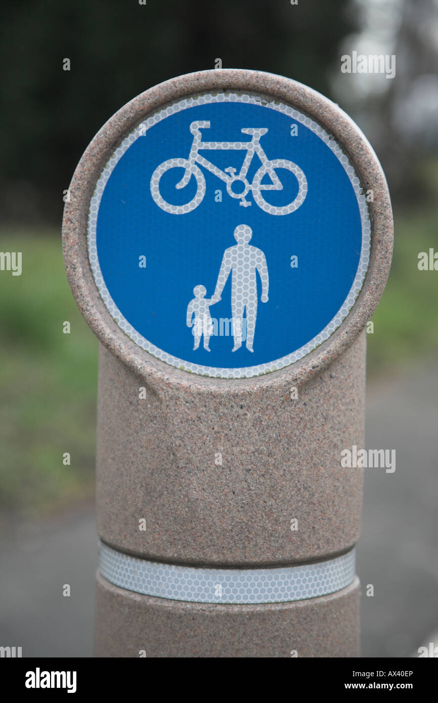 Cycle path pavement for pedestrians blue circular sign on post Stock