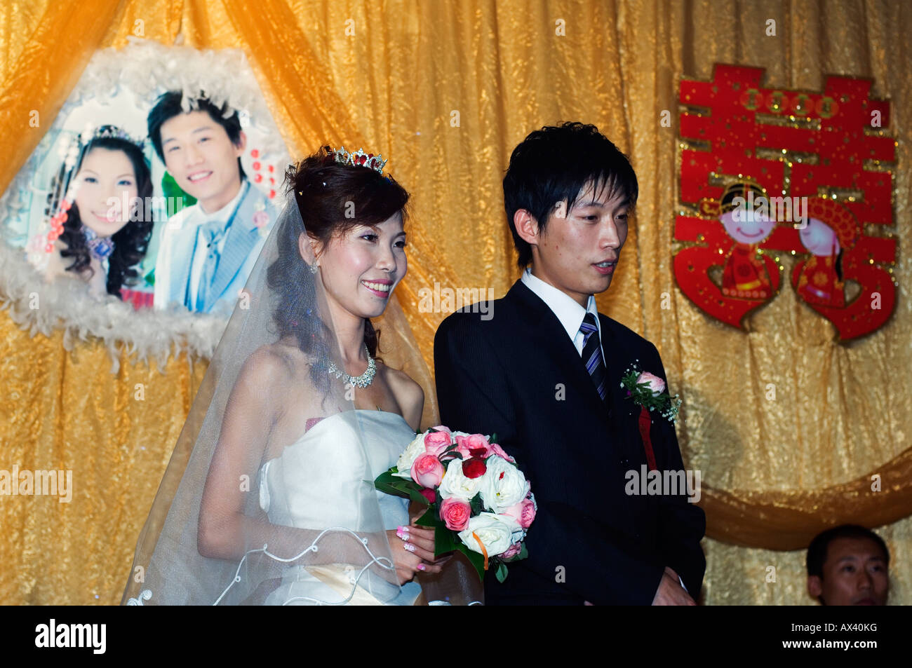 Chinese couple getting married in hires stock photography and images