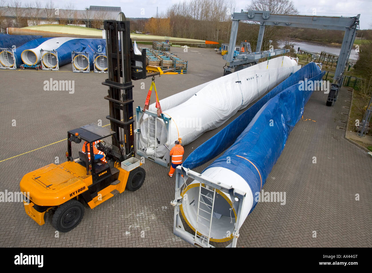 Loading blades for transport by sea Vestas Windturbine Manufacturers  Newport Isle of Wight England UK Stock Photo - Alamy