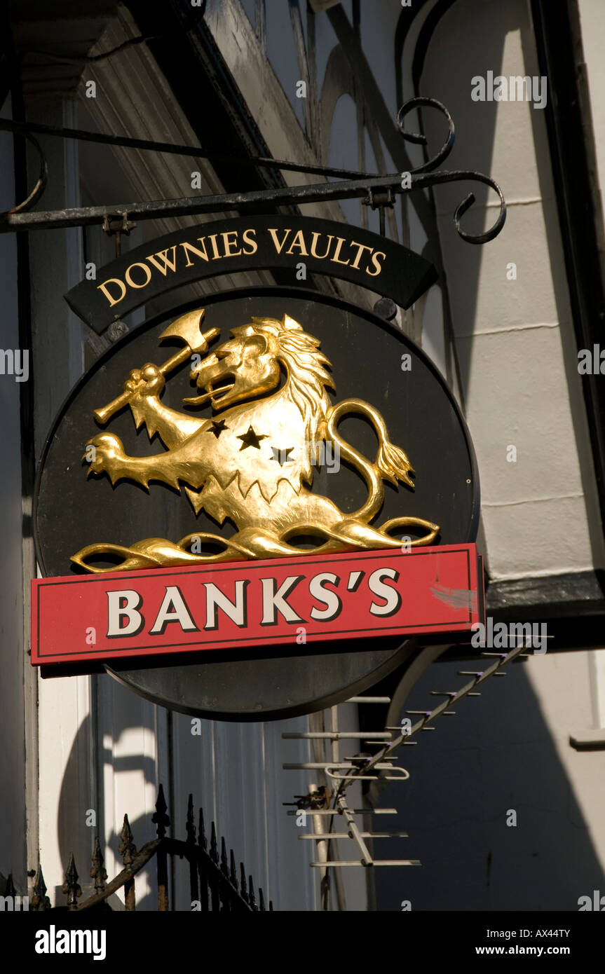Lion rampant heraldry heraldic symbol on pub sign outside Downies Arms Aberystwyth a Banks brewery chain tavern inn Stock Photo
