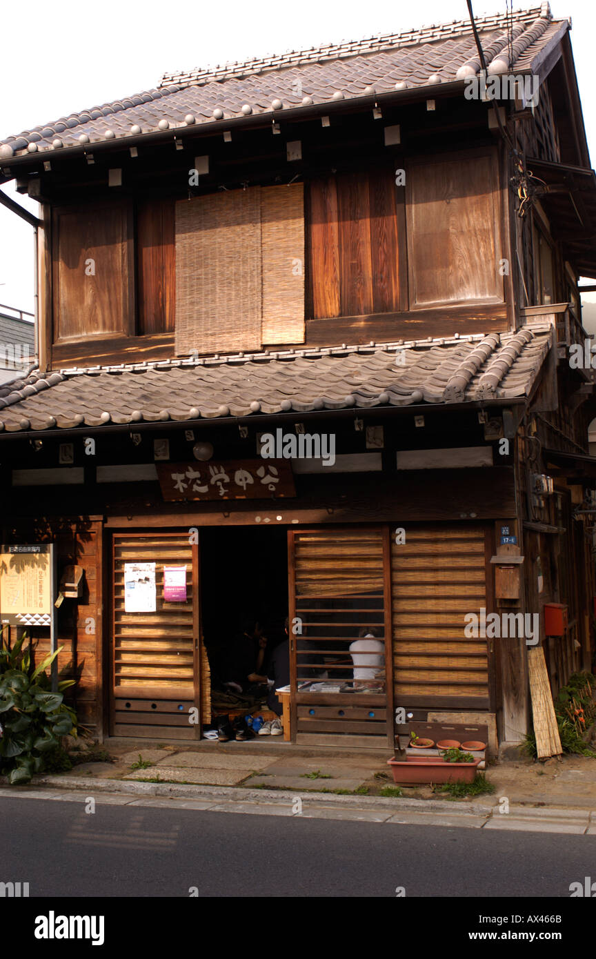 an old wooden house in the traditional yanaka district of
