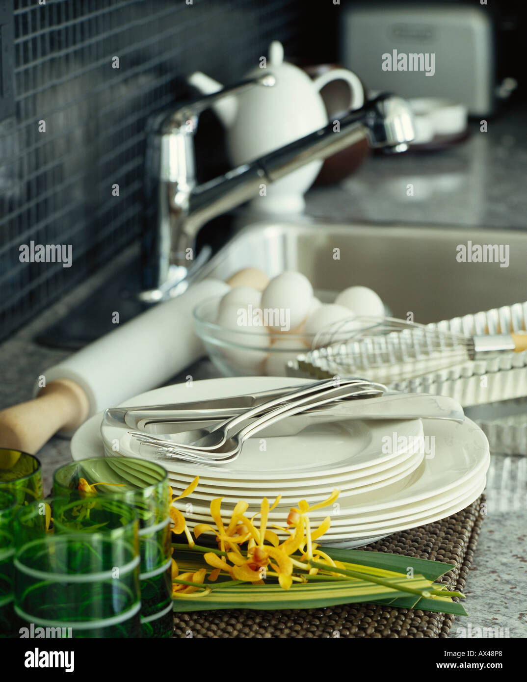 Dishes Stacked Beside Kitchen Sink Stock Photo Alamy