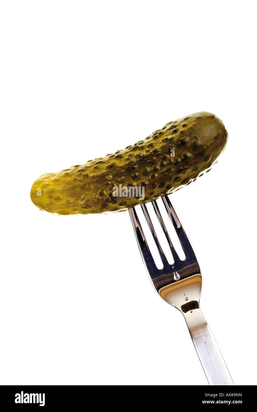 Pickle on fork, closeup Stock Photo Alamy