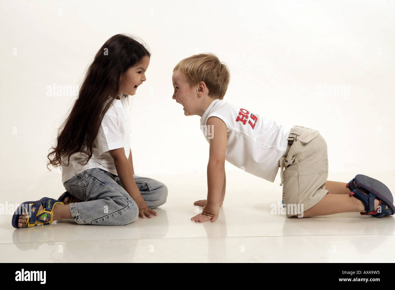 Side Profile Of A Indian Girl Playing With A Foreigner Boy Stock Photo Alamy
