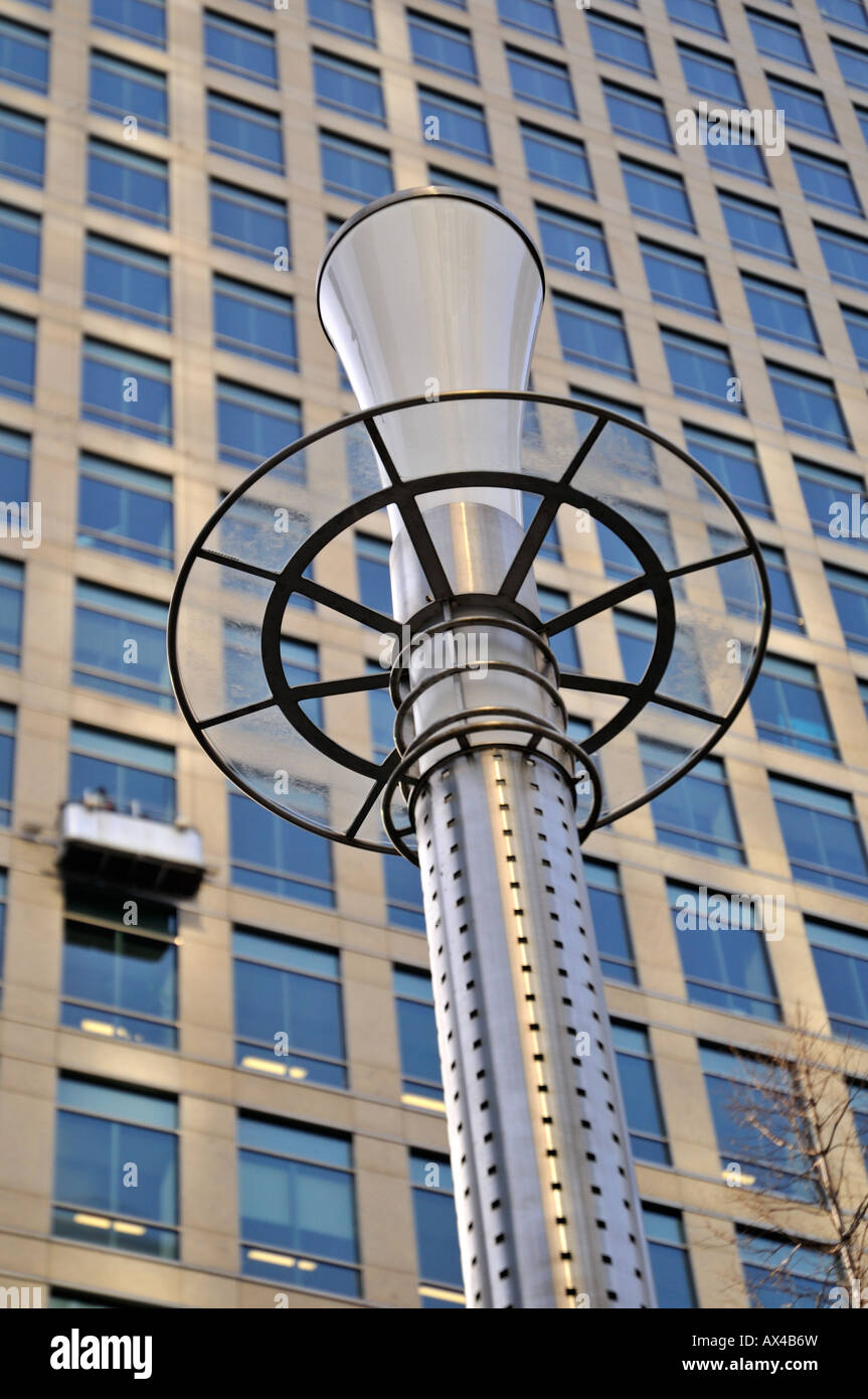 London canary wharf lamppost with window cleaning cradle in backgound London UK Stock Photo