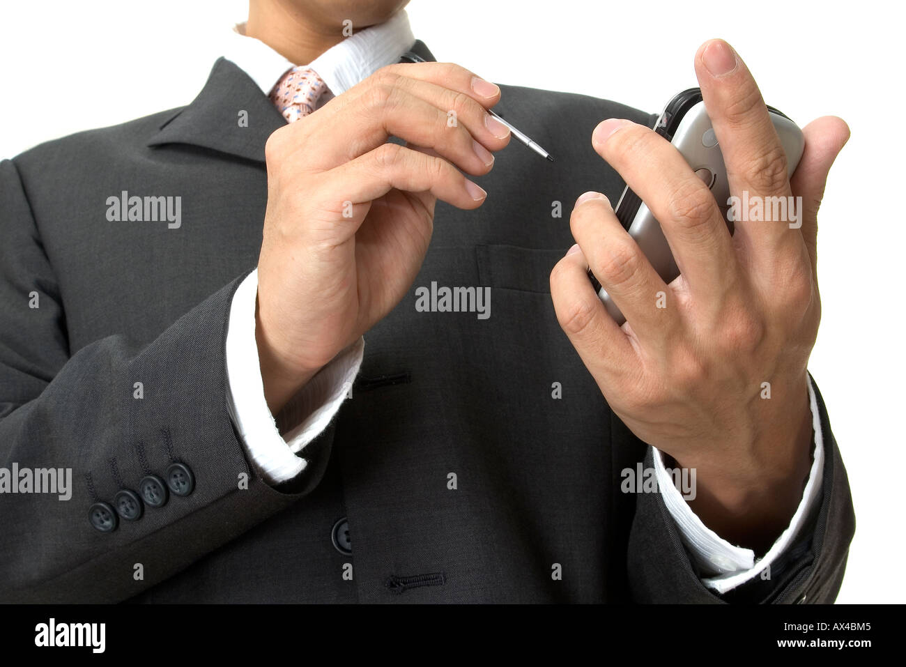 a businessman uses an electronic organiser Stock Photo Alamy