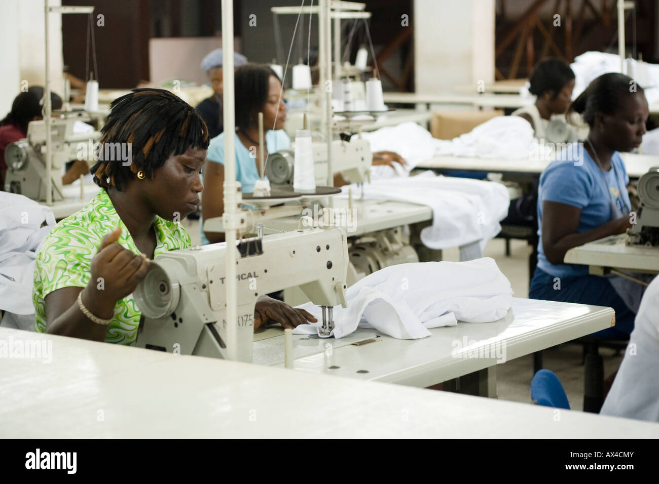 Female workers on assembly line in an apparel factory Stock Photo Alamy