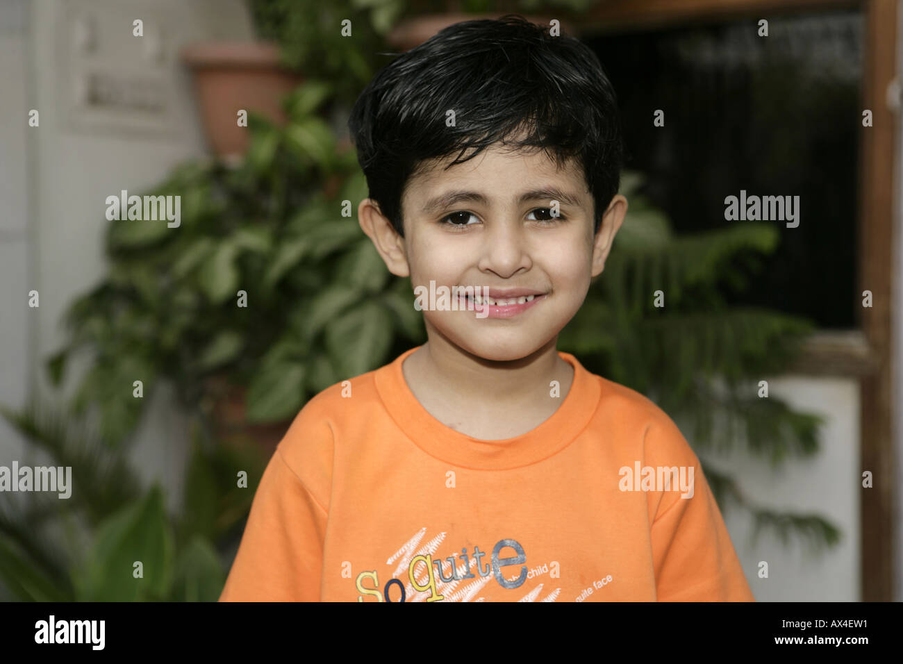 Portrait of a boy smiling Stock Photo - Alamy