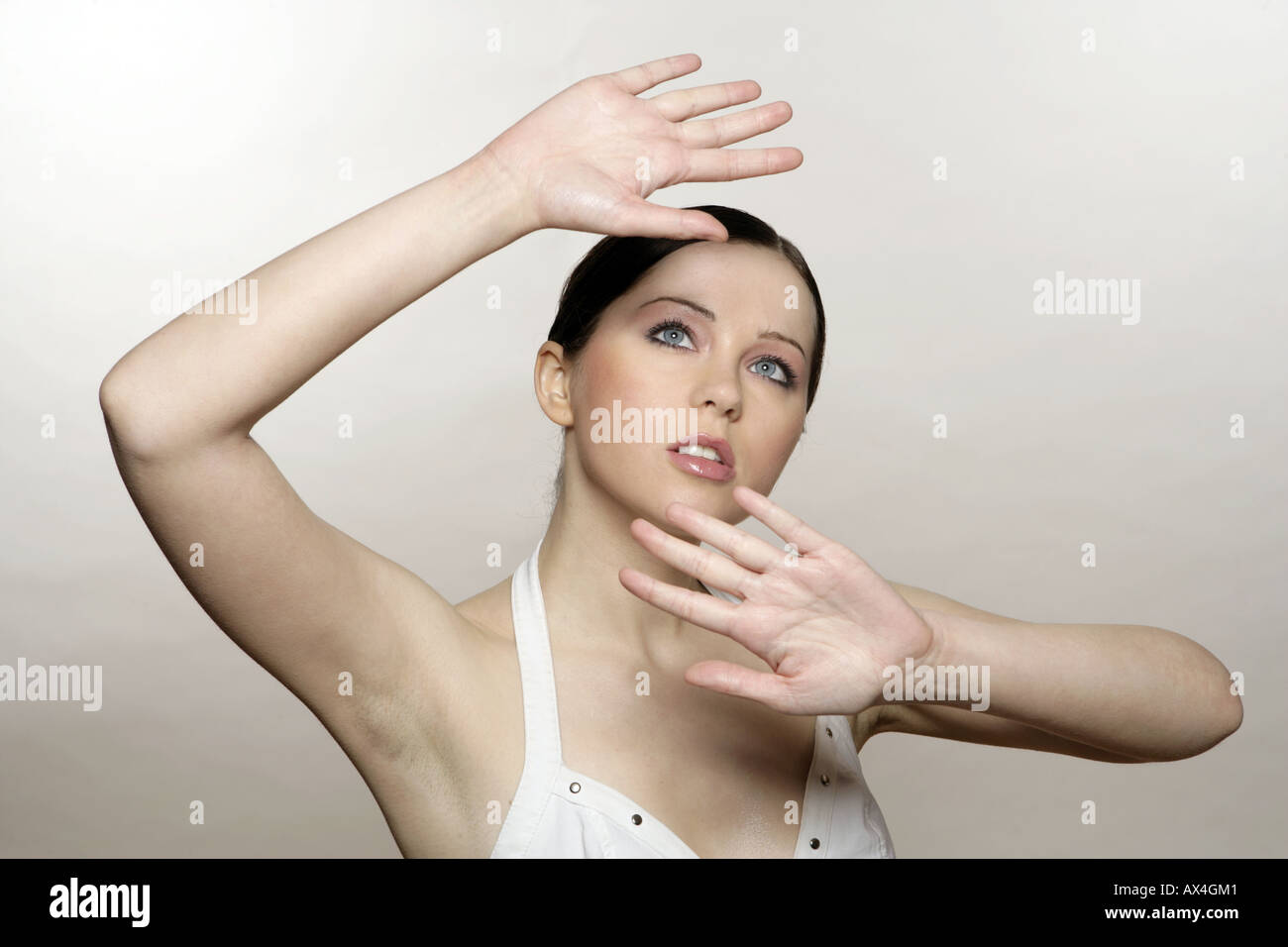 Hands protecting face, sun hires stock photography and images Alamy