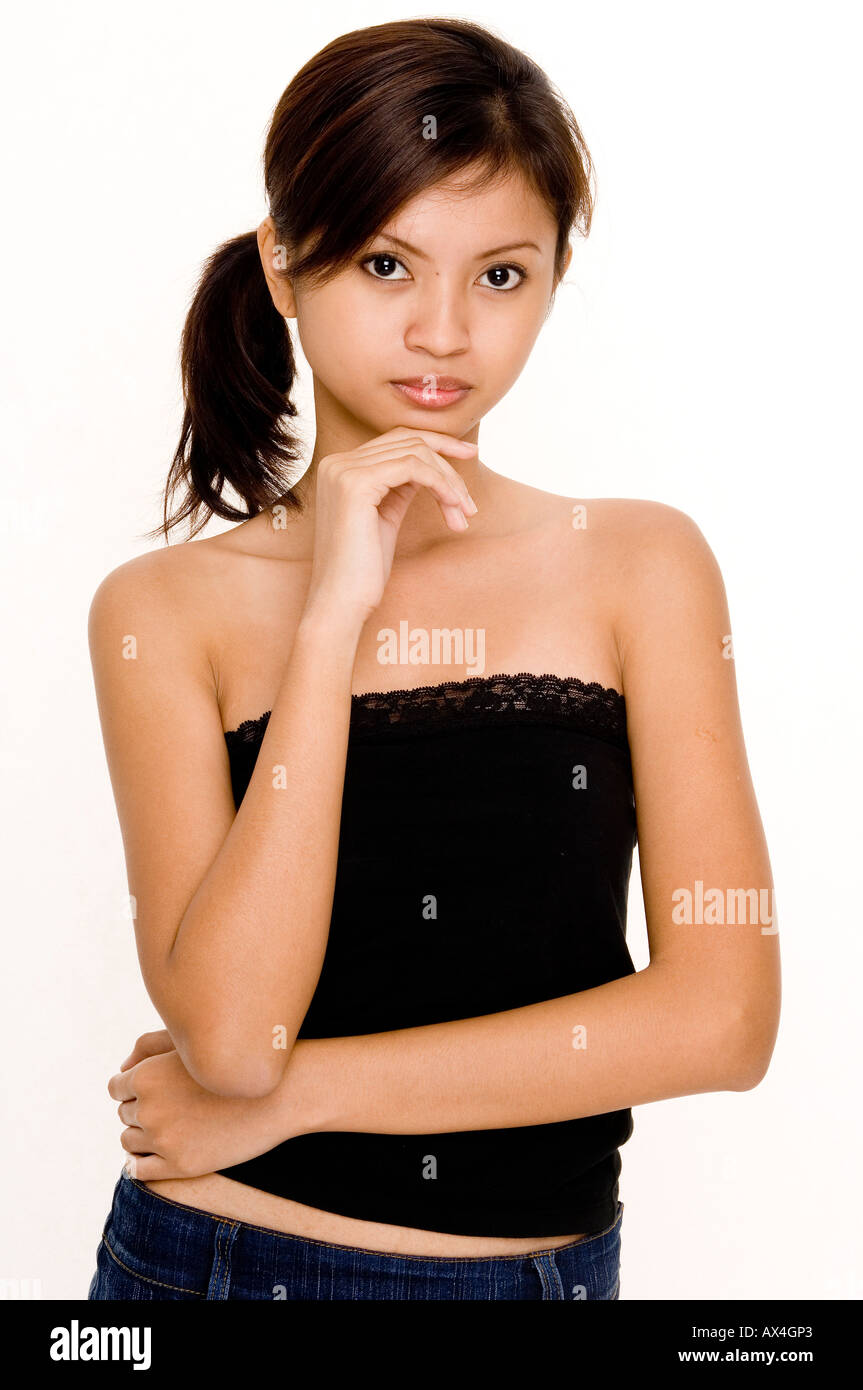 A pretty young asian model in casual clothes on white Stock Photo