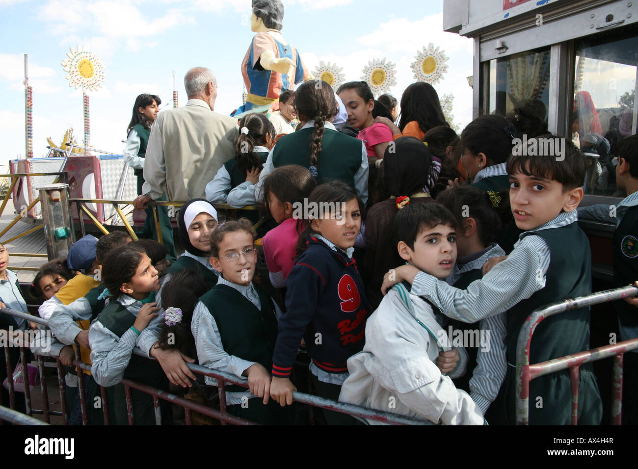 school children playing at fair in Amman, jordan Stock Photo - Alamy