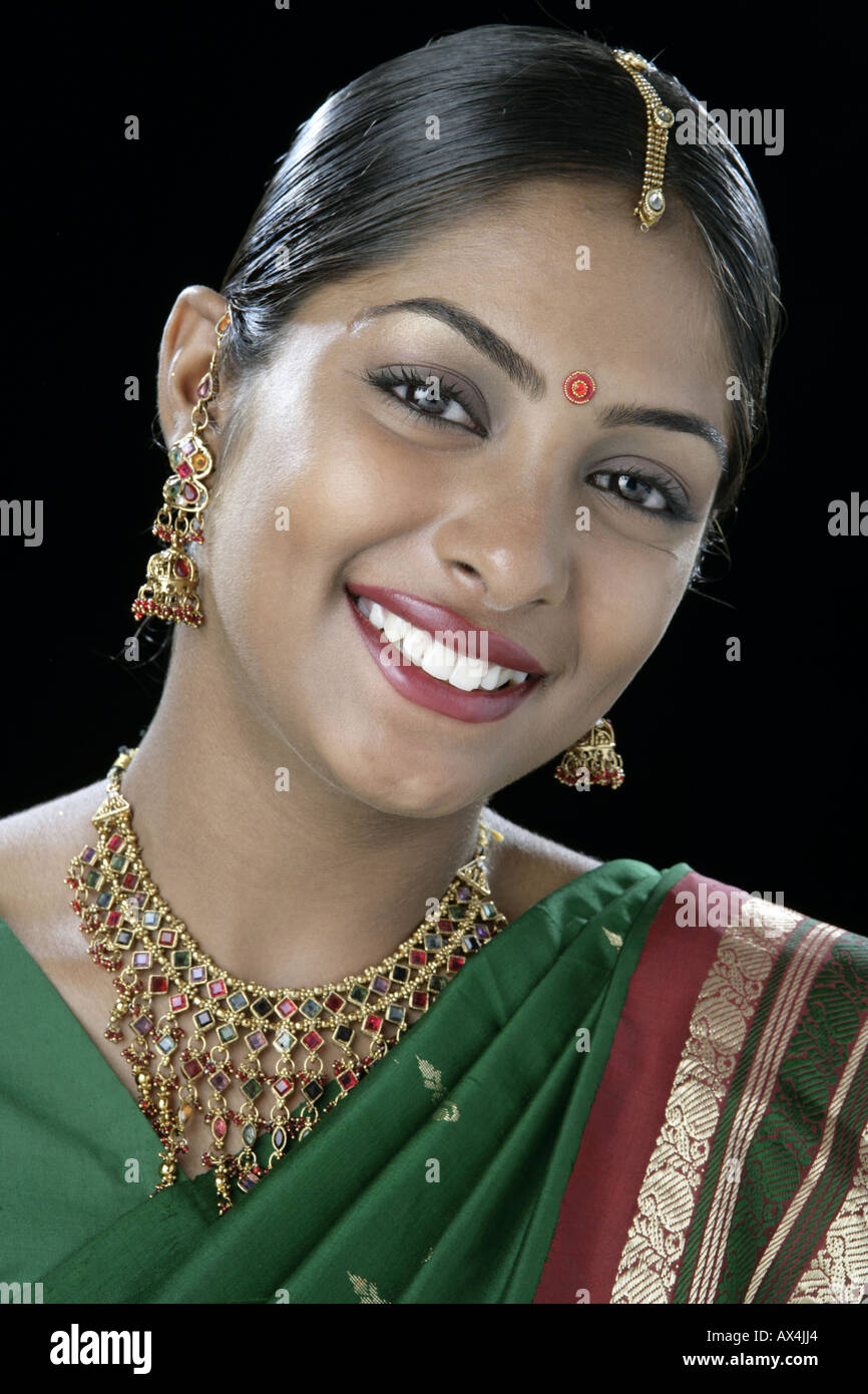 Indian lady wearing jewelry hi-res stock photography and images - Alamy