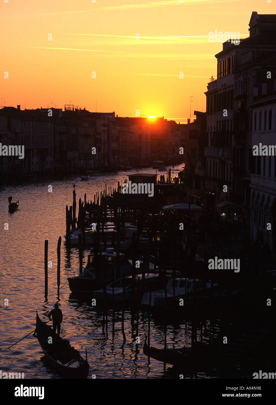 Gondolas on Grand Canal at sunset from Rialto bridge Venezia Venice Veneto Italy Stock Photo