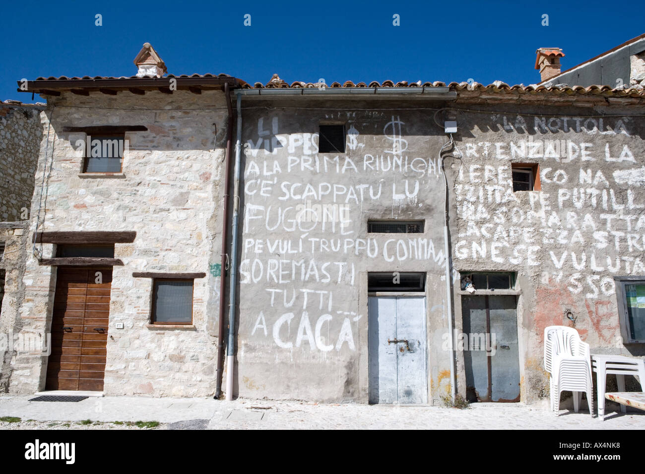 Protest grafitti on house at Castelluccio Monti Sibellini National Park Umbria Italy Stock Photo