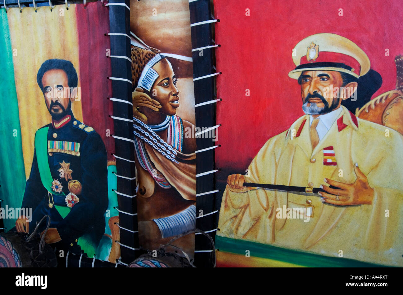 Window of shop selling souvenirs to tourists. Here portraits of Haile Selassie and tribeswoman Stock Photo