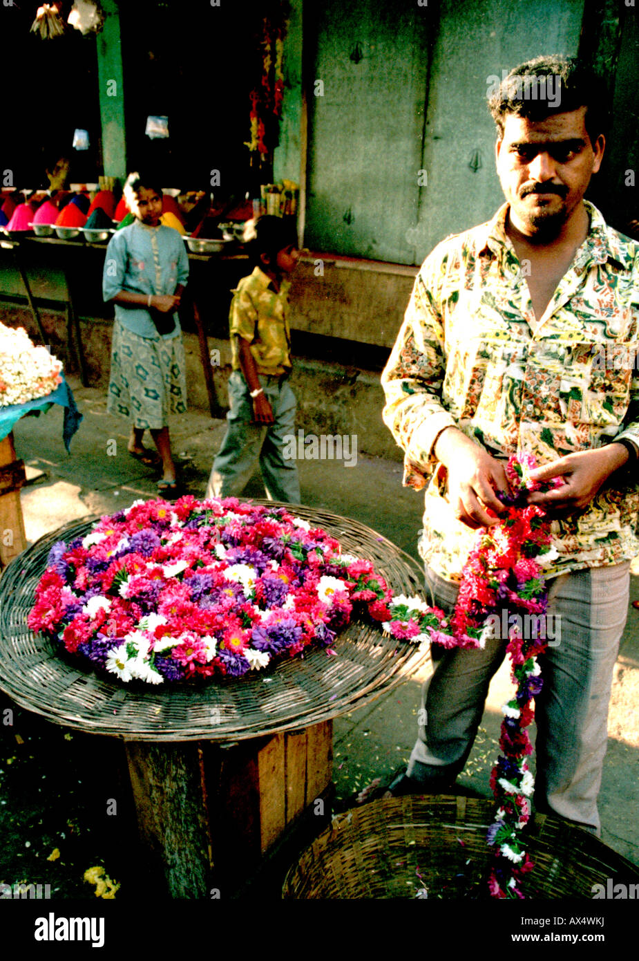 Flower vendor in Indian street market Stock Photo Alamy