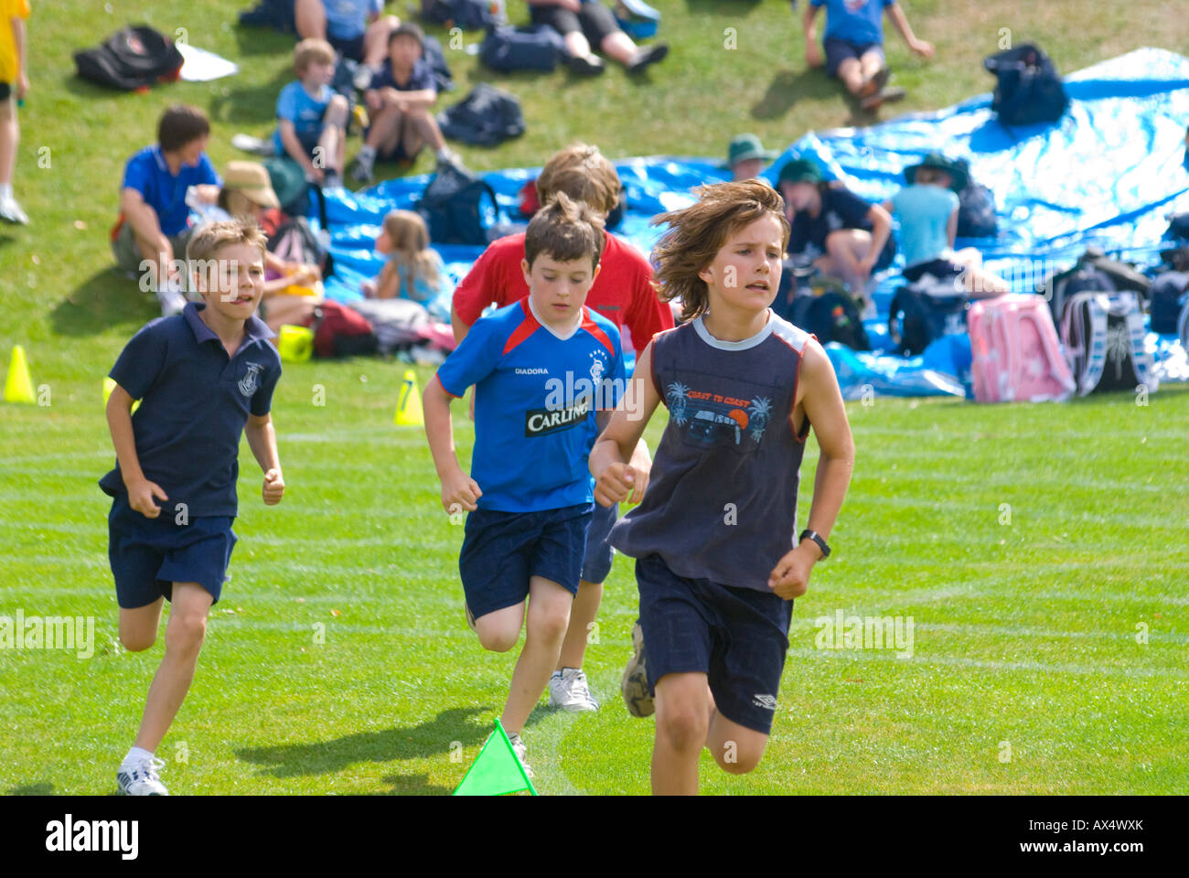 Boys competing in primary school sports in Tasmania Australia Stock Photo