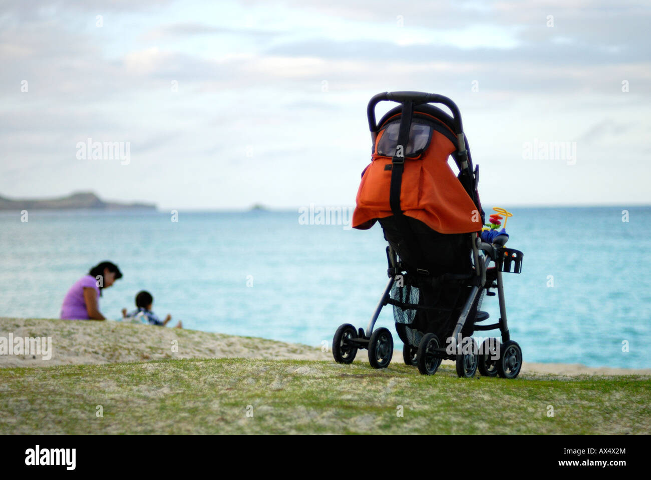 Beach stroller hi res stock photography and images Alamy