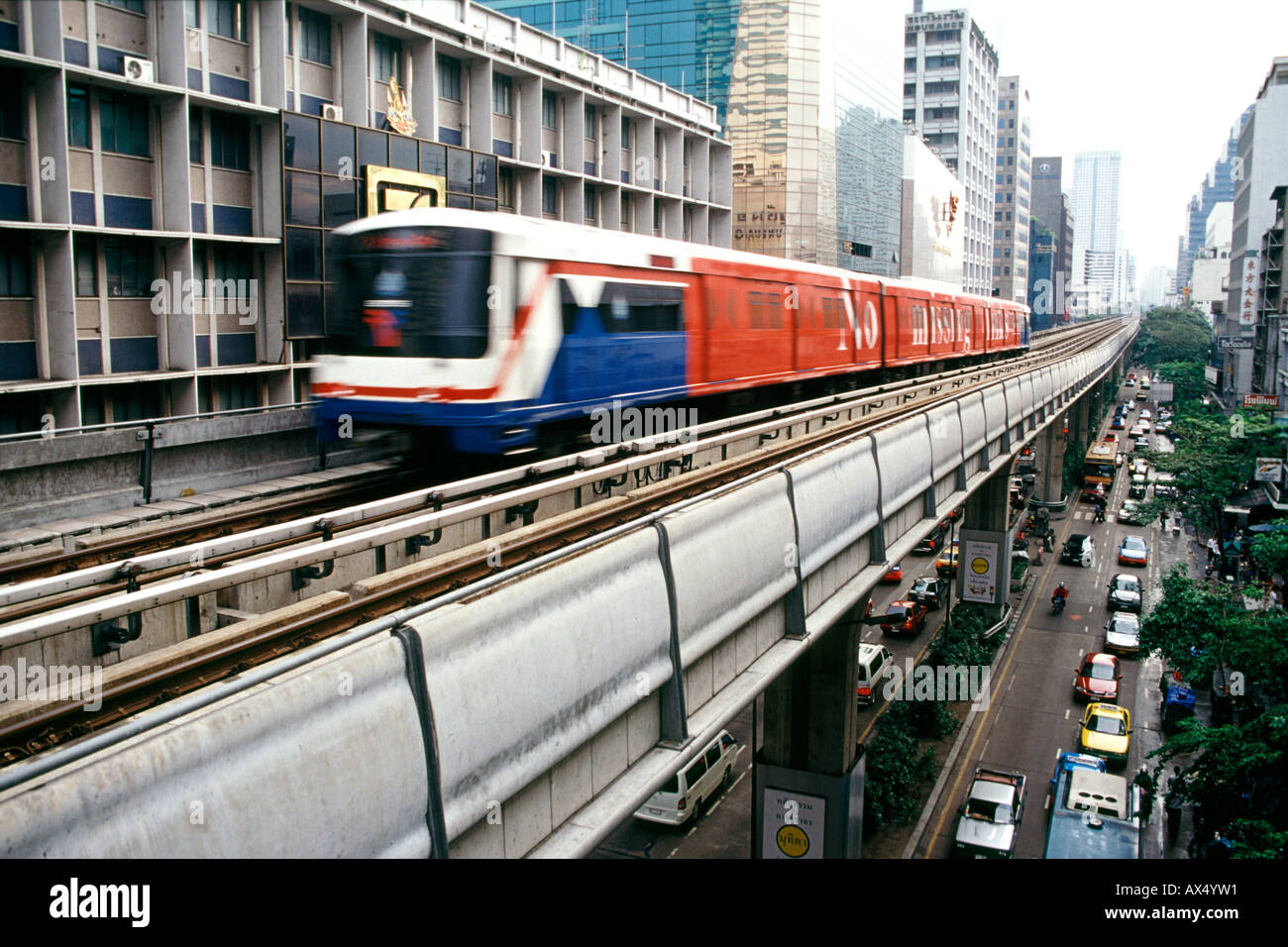 Rail and road traffic in Bangkok Thailand. Stock Photo