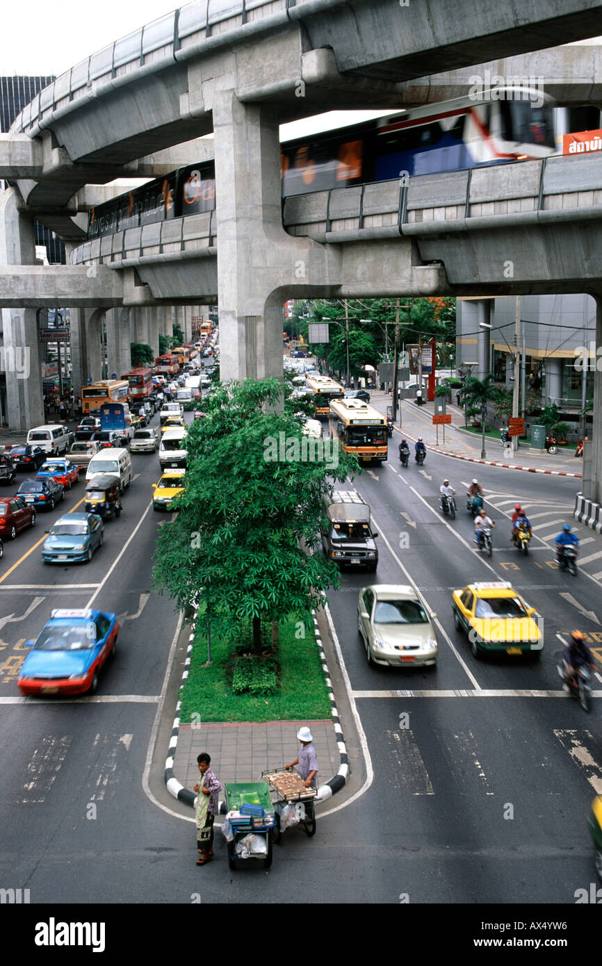 Rail and road traffic in Bangkok Thailand. Stock Photo