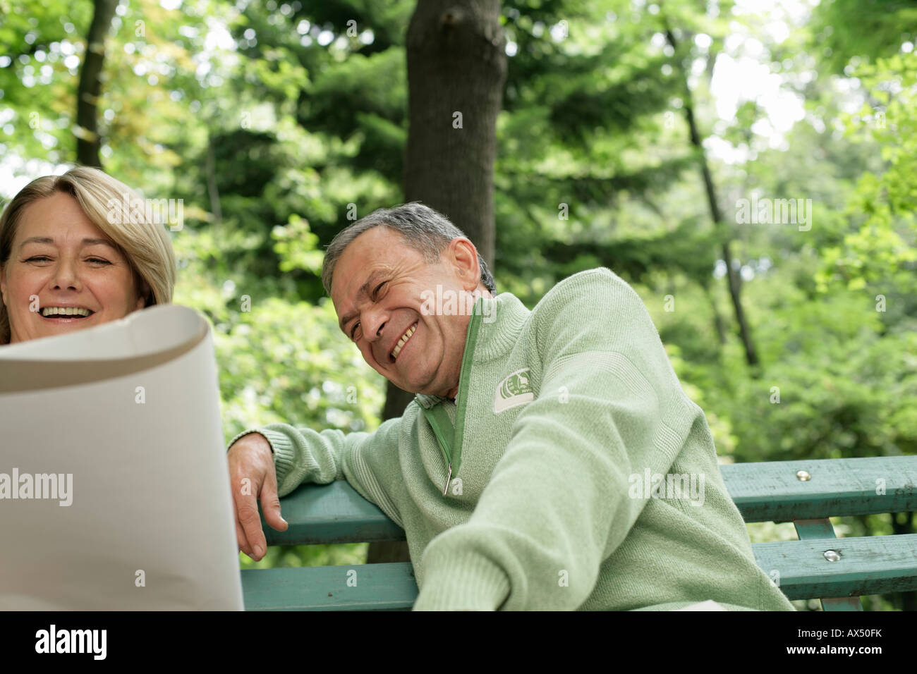 Mature woman on park bench hi-res stock photography and images - Alamy
