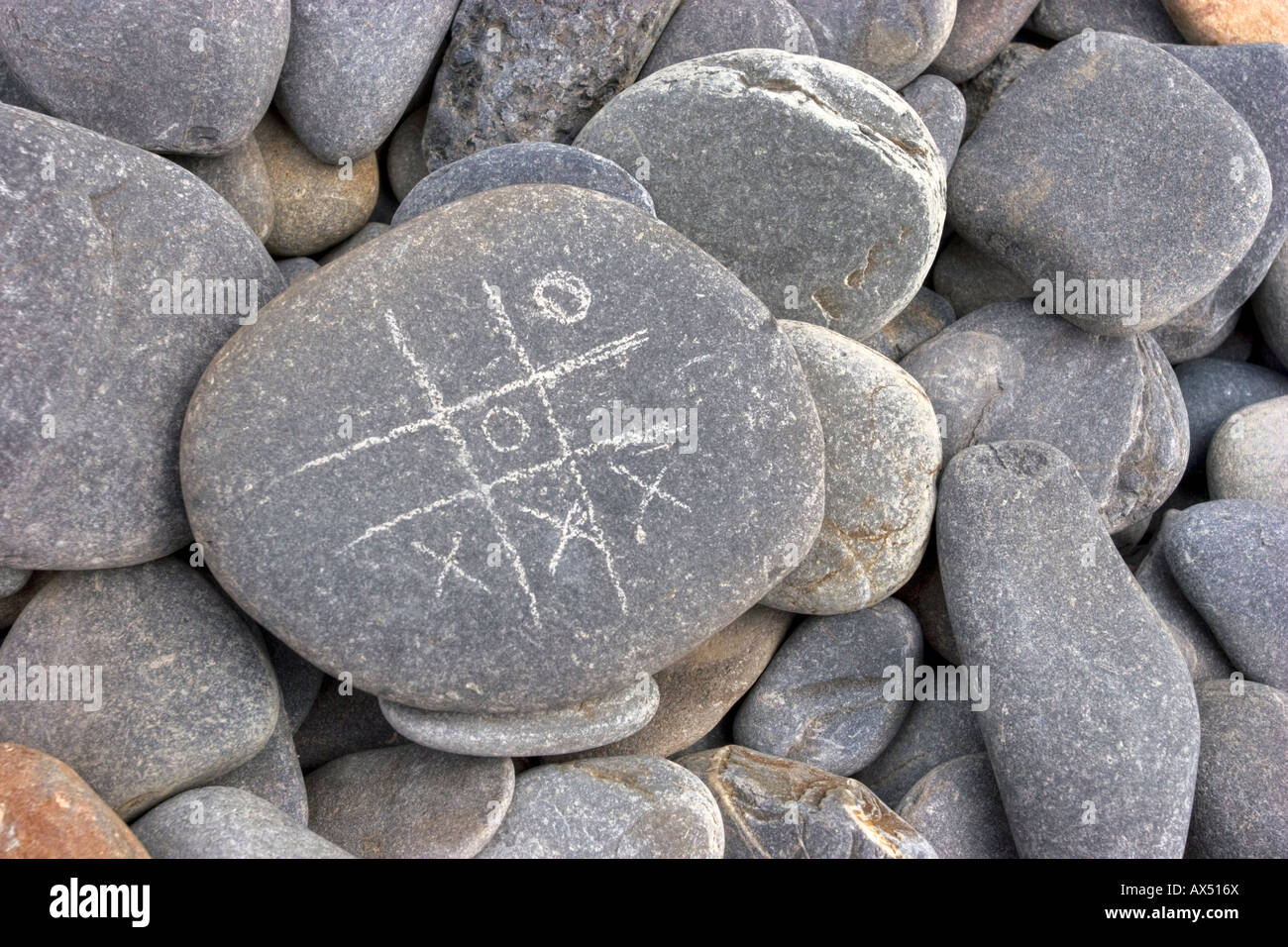 Noughts and crosses game played on the beach Stock Photo