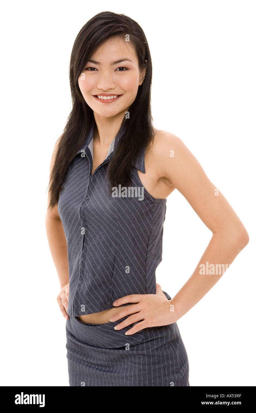 A full length portrait of a beautiful asian woman in business suit ...