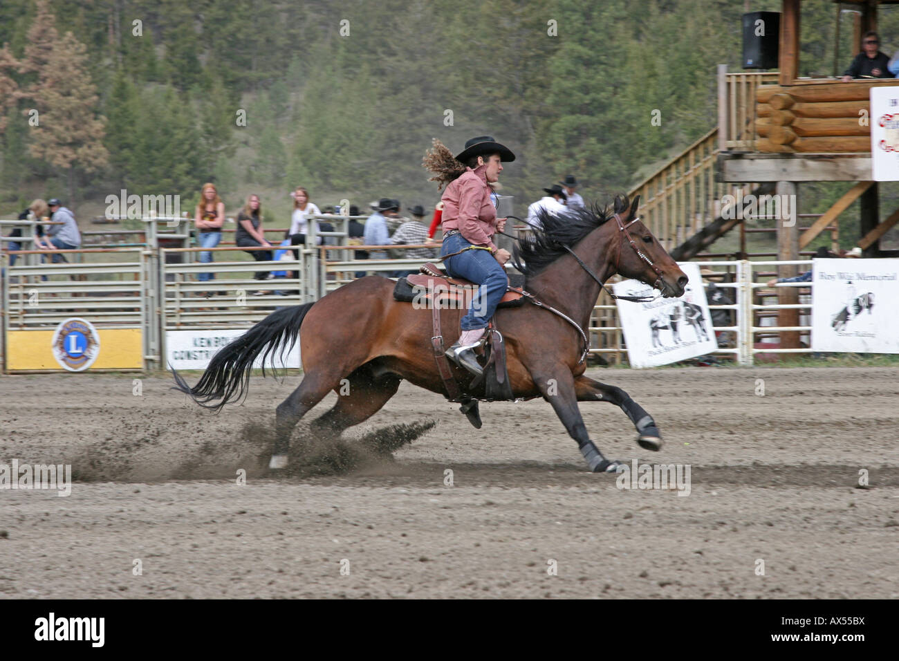 Barrel racing at a rodeo Stock Photo - Alamy