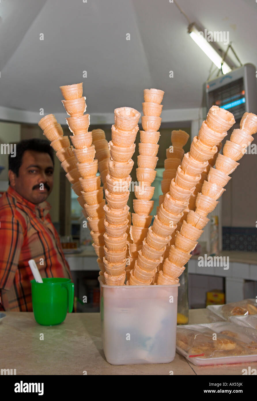 Empty stacked "ice cream" cones in small café Muscat Oman Stock Photo Alamy