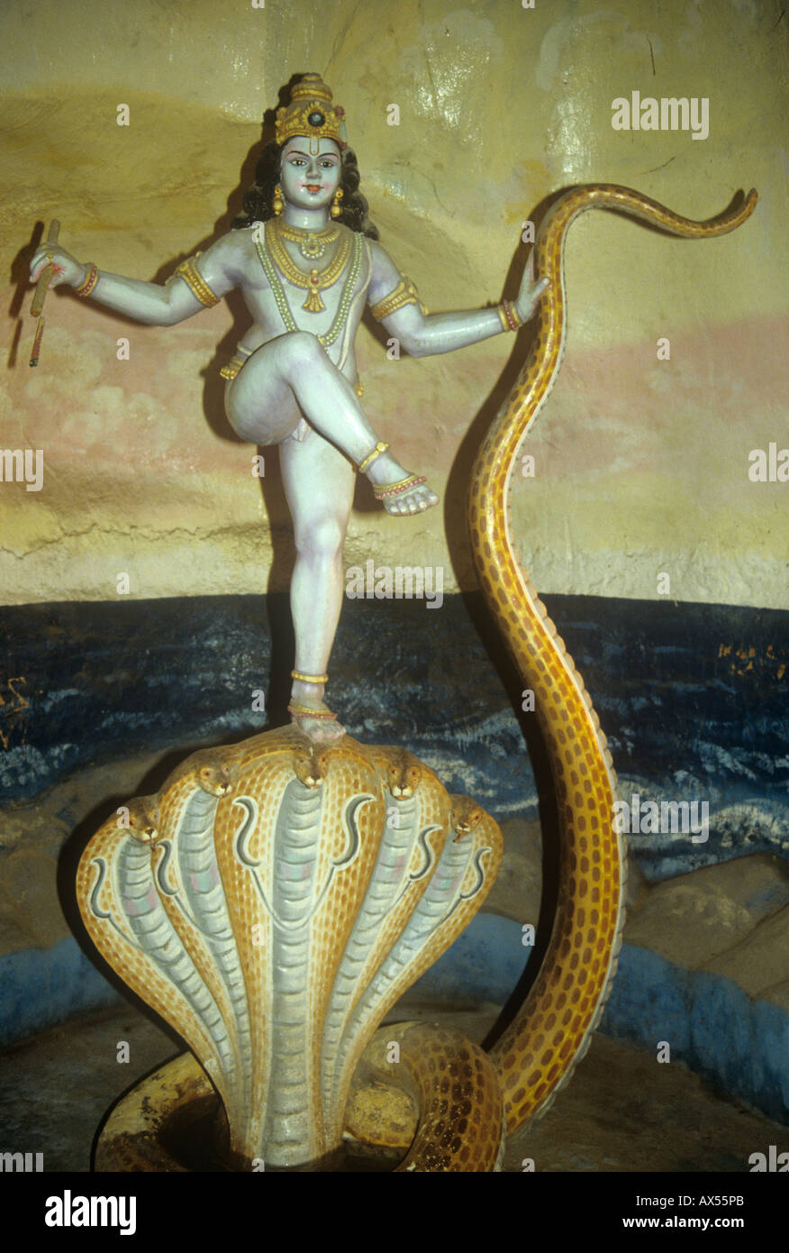 The Hindu God Lord Krishna dancing on the head of Kaliya, King of the