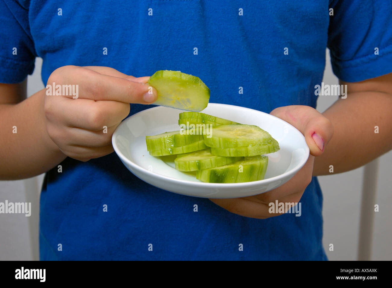 Plate with cucumber slices Stock Photo