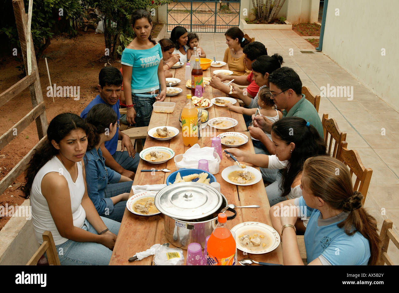 Group eating together on a terrace, Asuncion, Paraguay, South America Stock Photo