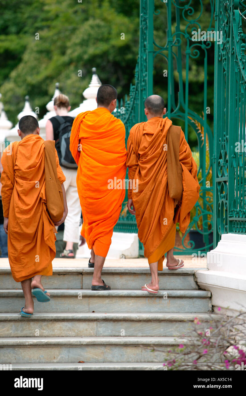 Monks walking The Royal Palace Phnom Penh Cambodia Asia Stock Photo