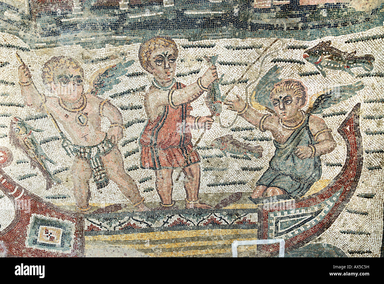 Puttos as fishermen in a boat mosaic floor Villa Casale Piazza Armerina Sicily Italy Stock Photo