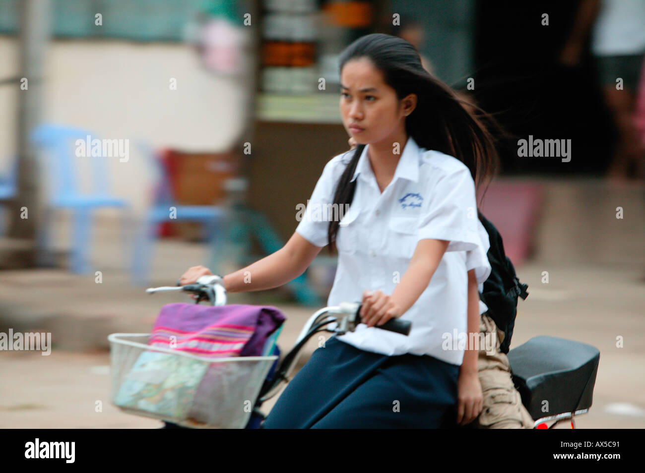 Girl coming from school Phnom Penh Cambodia Asia Stock Photo