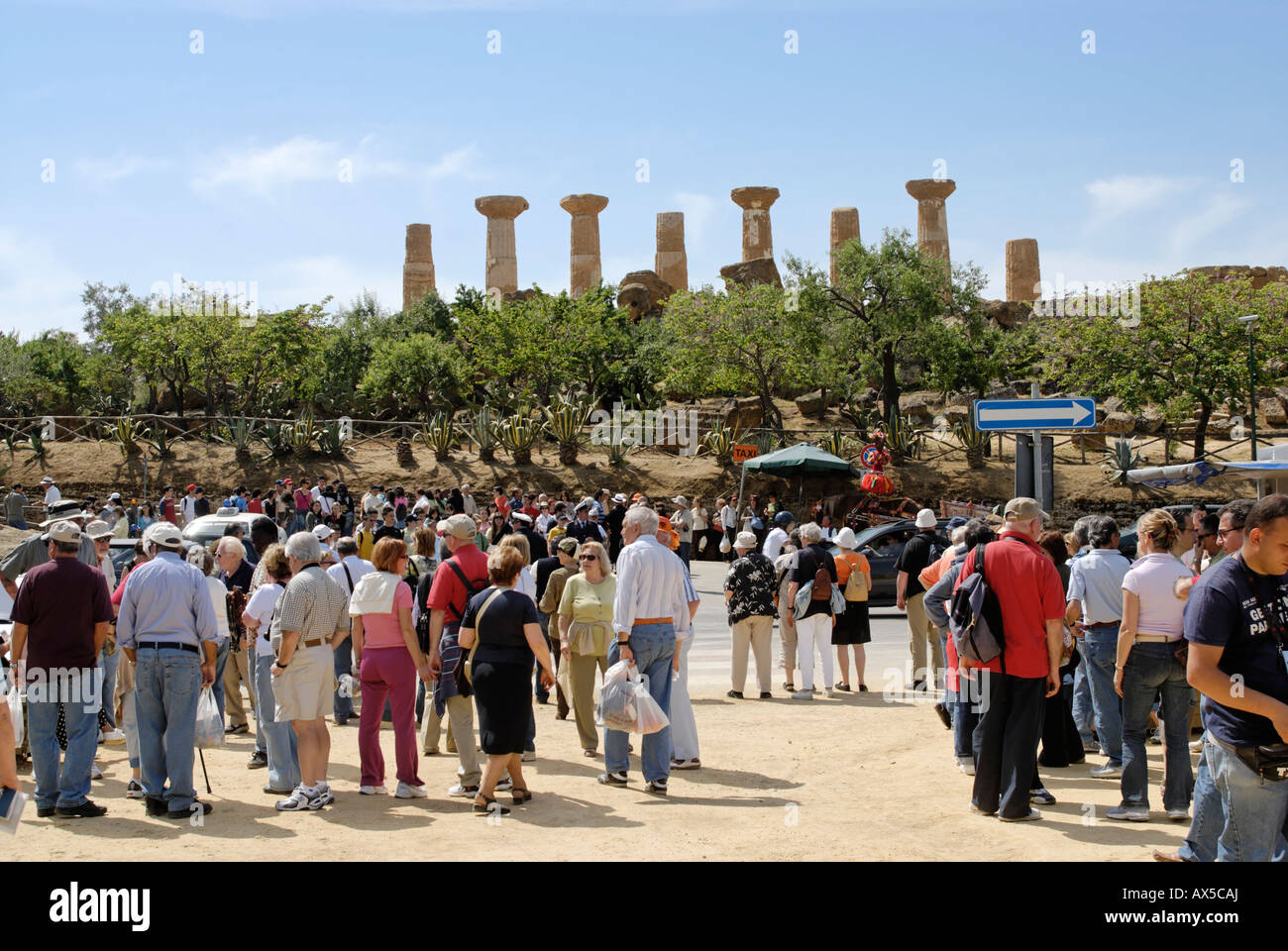Gathering place for tourists in front of the temple of Hercules temple Agrigento Sicily Italy Stock Photo