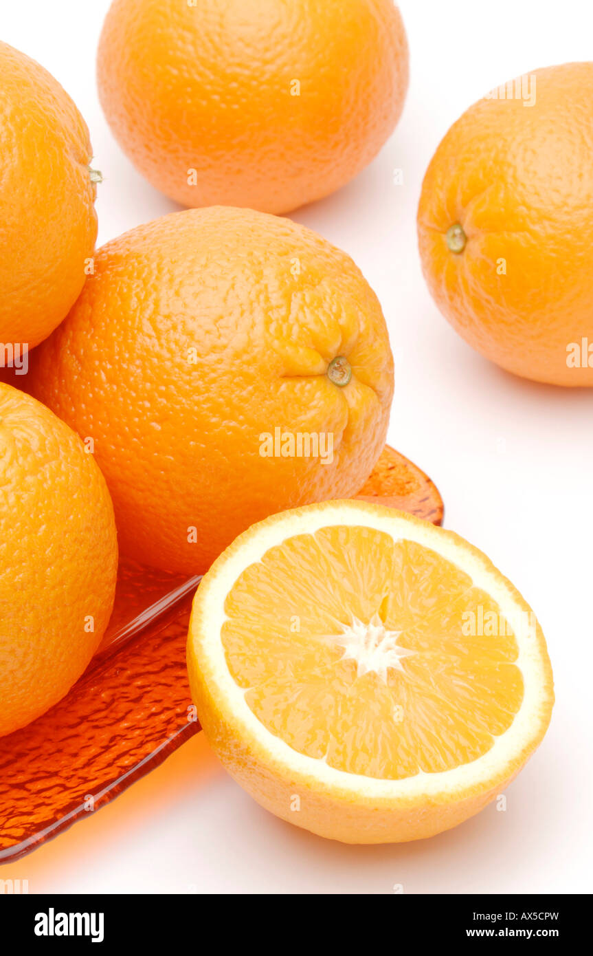 Bowl and oranges Stock Photo