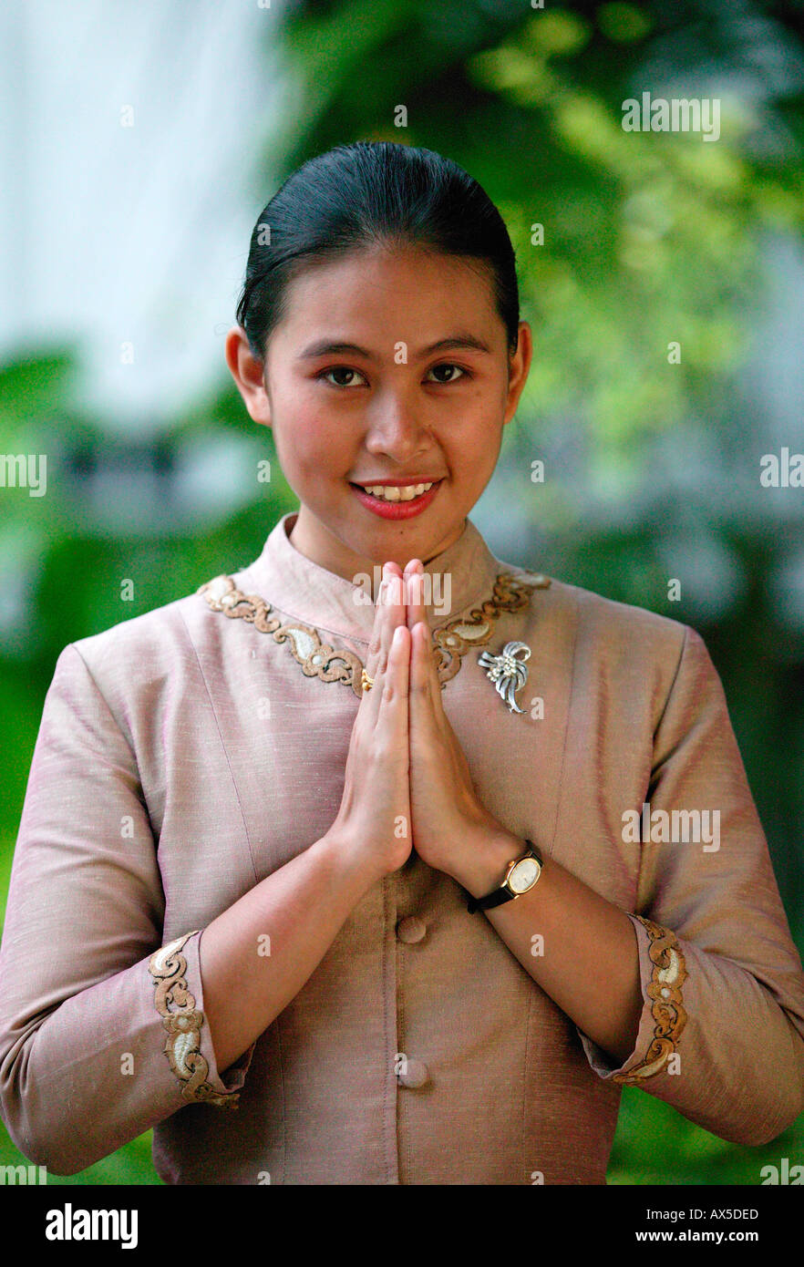 Thai young woman welcoming guest Phuket Thailand Asia Stock Photo