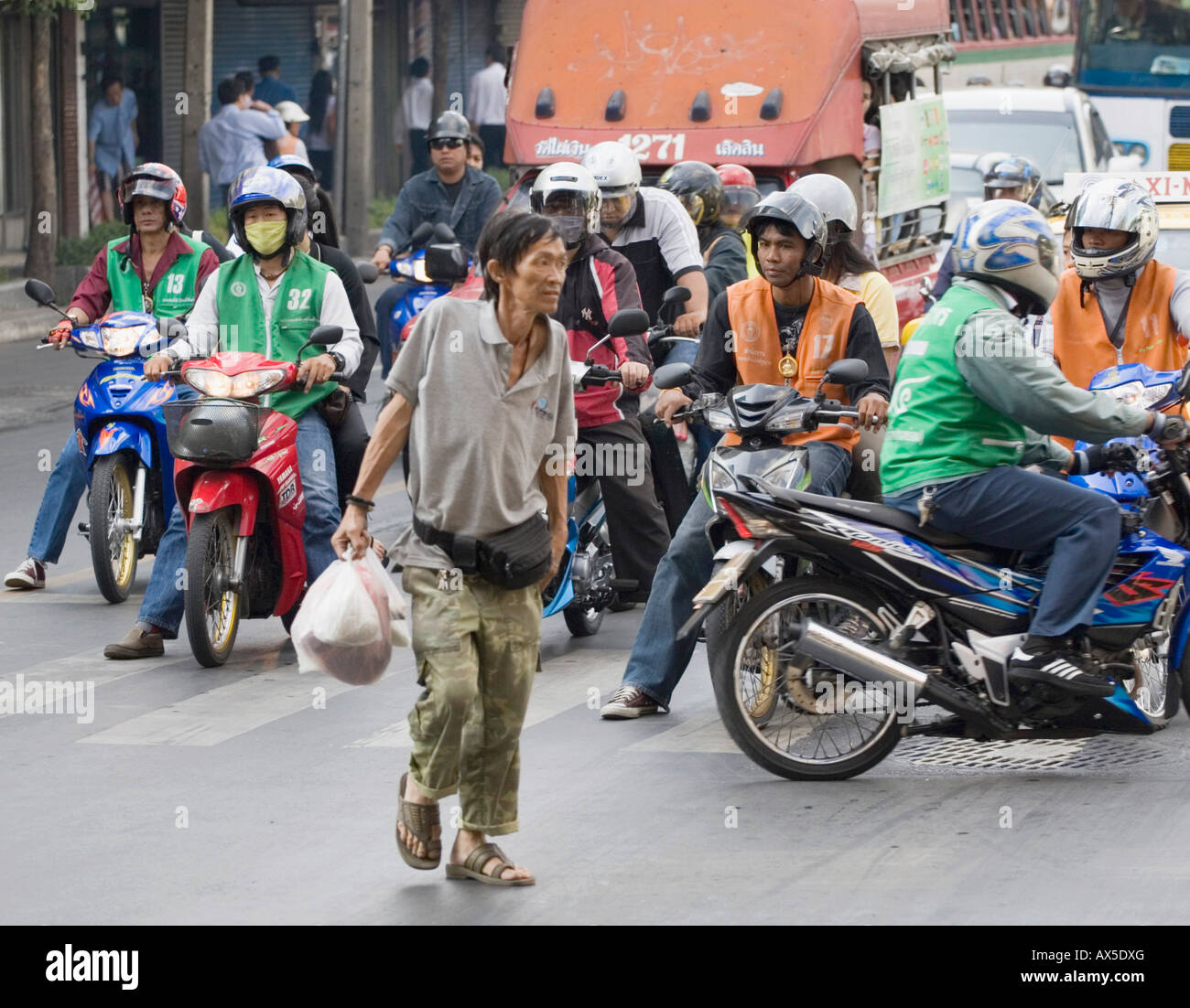 Waiting drivers on their bikes, Thailand Stock Photo