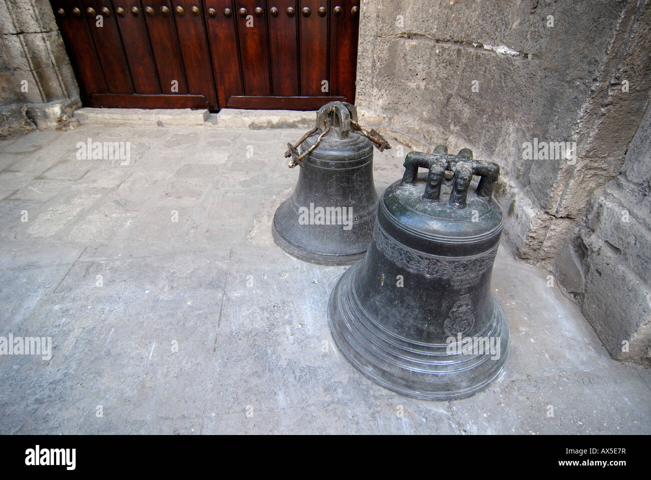 Historical bells and castle gate in the old part of Havana, Cuba Stock Photo