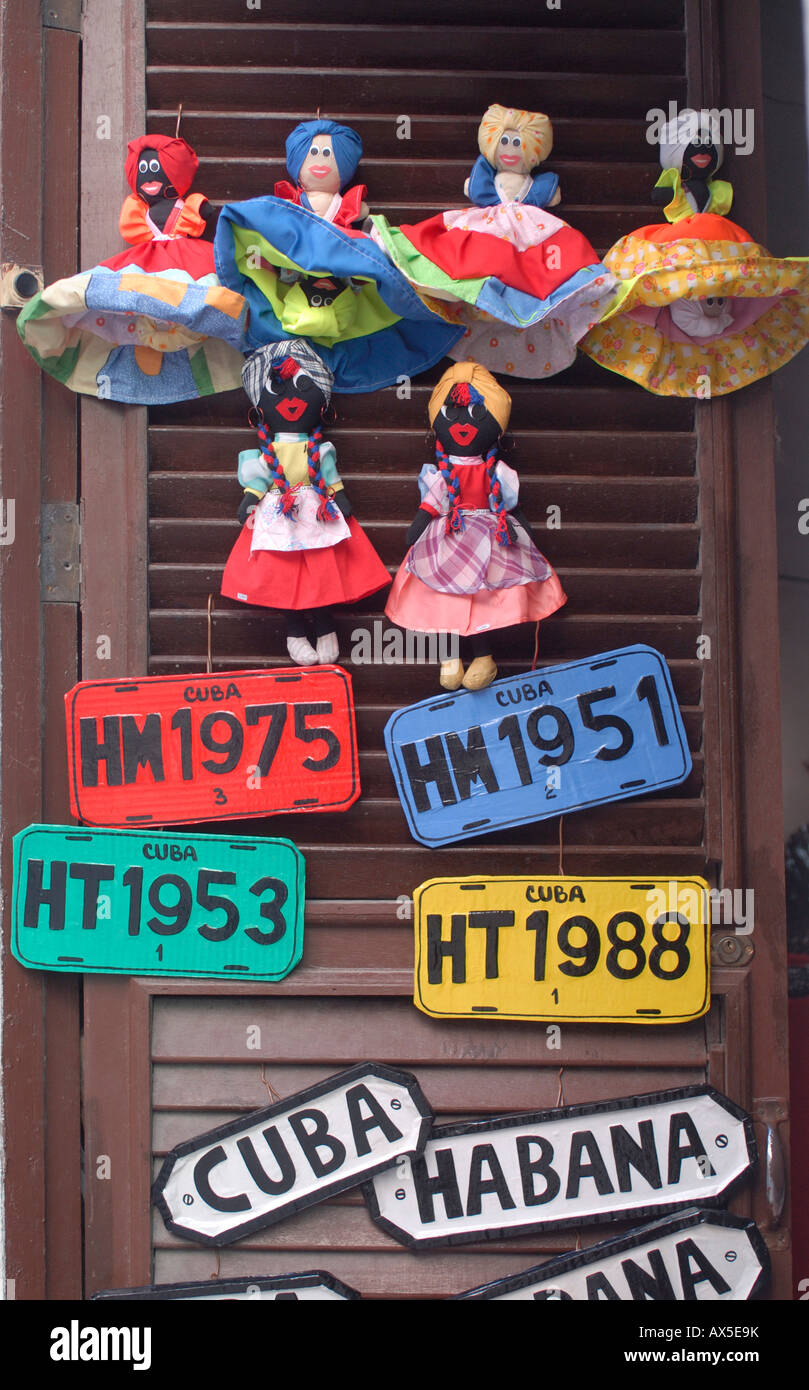 Souvenirs: dolls, licence plates and door signs, Havana, Cuba Stock Photo