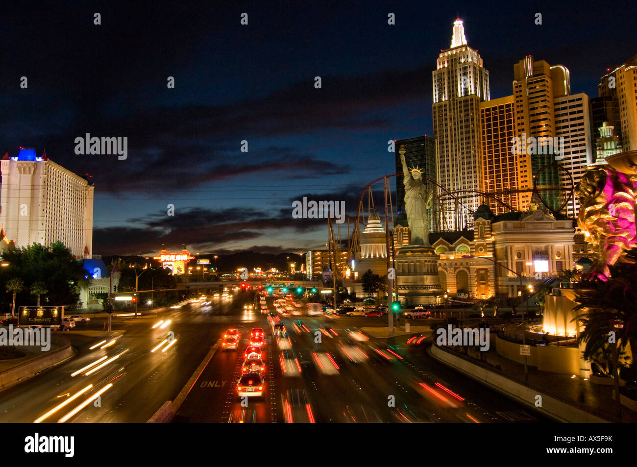 Traffic on West Tropicana Avenue between the New York and Excalibur Resort Casinos in Las Vegas, Nevada, USA, North America Stock Photo